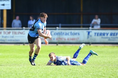 050425 - Bridgend v Cardiff RFC - Super Rygbi Cymru (SRC) - Matty Young of Cardiff brushes off Coum Nott of Bridgend Ravens