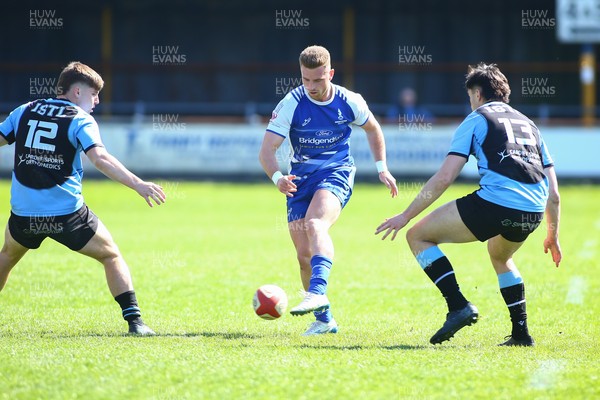 050425 - Bridgend v Cardiff RFC - Super Rygbi Cymru (SRC) - Lloyd Wilkins of Bridgend Ravens chips through the Cardiff defence