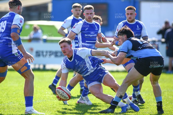 050425 - Bridgend v Cardiff RFC - Super Rygbi Cymru (SRC) - Edd Howley of Bridgend Ravens is tackled by Elijah Evans of Cardiff
