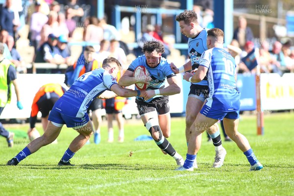 050425 - Bridgend v Cardiff RFC - Super Rygbi Cymru (SRC) - Joe Goodchild of Cardiff is tackled by McCauley Rowley of Bridgend Ravens
