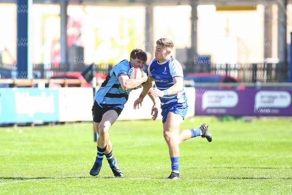 050425 - Bridgend v Cardiff RFC - Super Rygbi Cymru (SRC) - Matty Young of Cardiff is tackled by McCauley Rowley of Bridgend Ravens