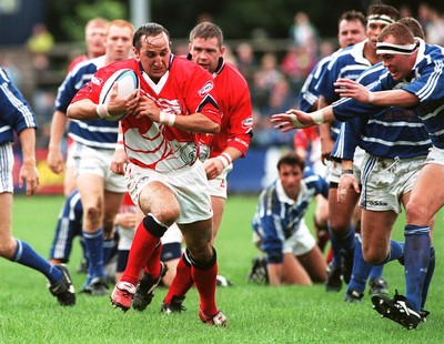 230897 - Bridgend v Llanelli - Rupert Moon breaks past Chris Stevens