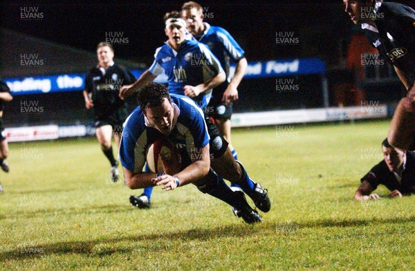 291003 - Bridgend v Neath - Bridgend's Dean Fitzgerald dives over to score