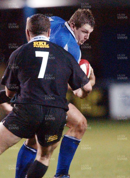 291003 - Bridgend v Neath - Bridgend's Anthony Piper tries to get past Jon McPhail