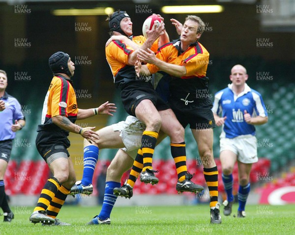 190403 - Bridgend v Newport - Principality Cup Semi Final - Newport's Ian Gough and Jason Jones-Hughes both go for the high ball