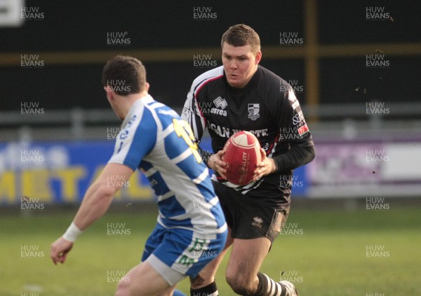 14.01.12 Bridgend RFC v Pontypridd RFC - Principality Premiership - Pontypridd's Gary Williams takes on Bridgend's Kristian Phillips 