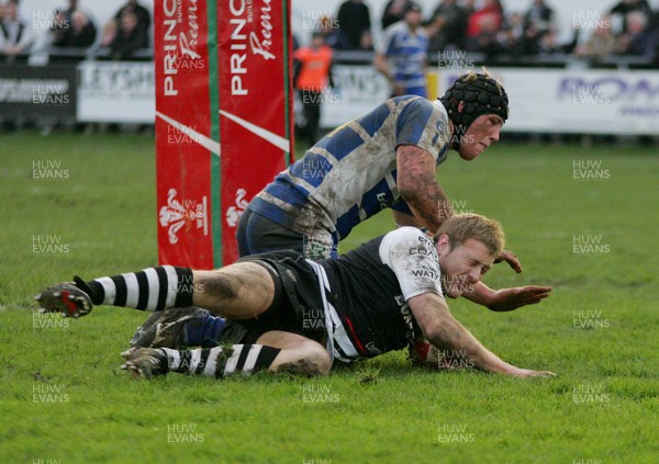 14.01.12 Bridgend RFC v Pontypridd RFC - Principality Premiership - Pontypridd's Chris Clayton dives in to score a try 