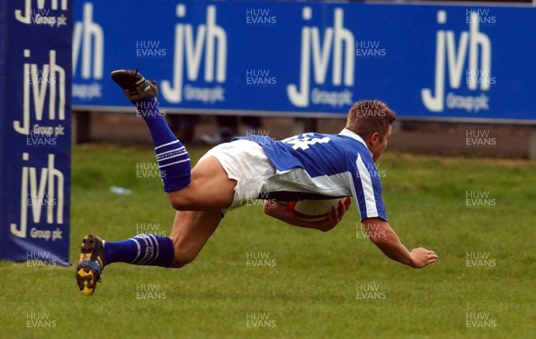 260403 - Bridgend v Swansea - Welsh Premiership - Bridgend's Paul Jones dives over only to have his try disallowed