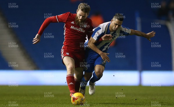 240117 - Brighton & Hove Albion v Cardiff City - SkyBet Championship - Aron Gunnarsson is tackled by Beram Kayal of Brighton