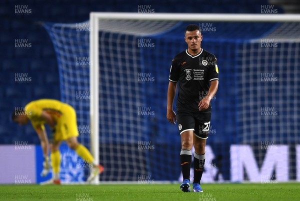 220921 - Brighton & Hove Albion v Swansea City - Carabao Cup - Joel Latibeaudiere of Swansea City looks dejected after second Brighton goal