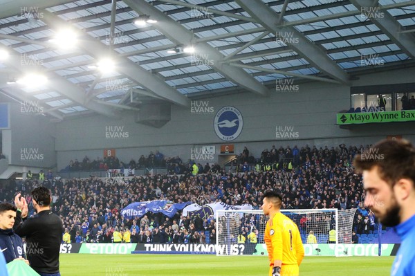 160419 - Brighton and Hove Albion v Cardiff City - Premier League - Cardiff fans welcome the team onto the pitch