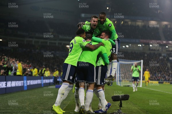 160419 - Brighton and Hove Albion v Cardiff City - Premier League - Goalscorer Sean Morrison is mobbed by his team mates after scoring