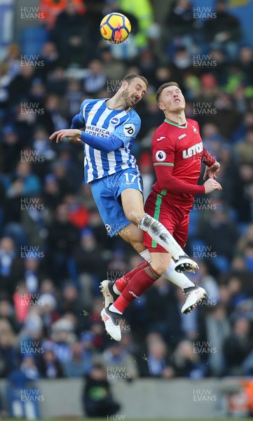 240218 - Brighton and Hove Albion v Swansea City, Premier League - Glenn Murray of Brighton and Alfie Mawson of Swansea City compete for the ball