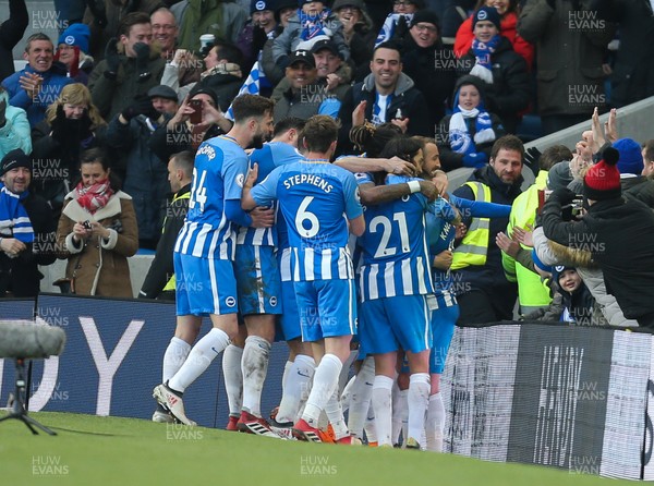 240218 - Brighton and Hove Albion v Swansea City, Premier League - Brighton players celebrate after the third goal