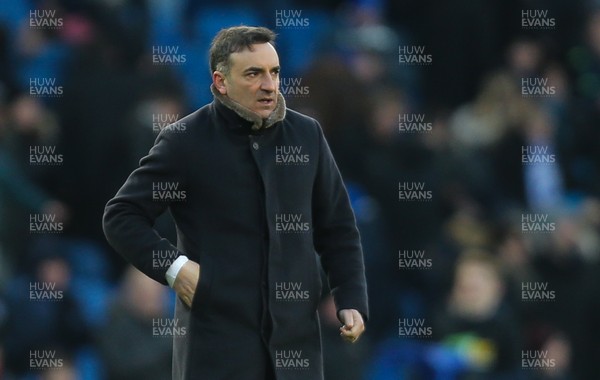 240218 - Brighton and Hove Albion v Swansea City, Premier League - Swansea City manager Carlos Carvalhal applauds the fans at the end of the match