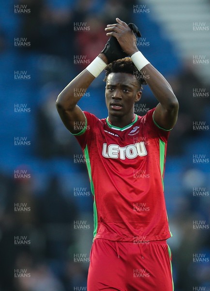 240218 - Brighton and Hove Albion v Swansea City, Premier League - Tammy Abraham of Swansea City applauds the fans at the end of the match