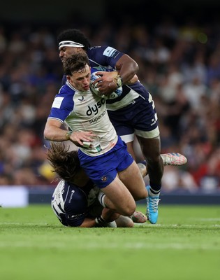 100525 - Bristol Bears v Bath Rugby - Gallagher Premiership - Louie Hennessey of Bath is tackled by Benhard Janse van Rensburg and Kalaveti Ravouvou of Bristol 