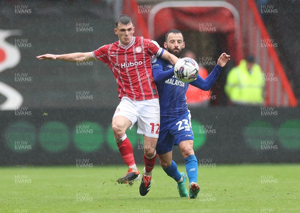 020324 - Bristol City v Cardiff City, EFL Sky Bet Championship - Manolis Siopis of Cardiff City and Jason Knight of Bristol City compete for the ball