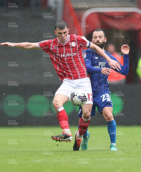 020324 - Bristol City v Cardiff City, EFL Sky Bet Championship - Manolis Siopis of Cardiff City and Jason Knight of Bristol City compete for the ball