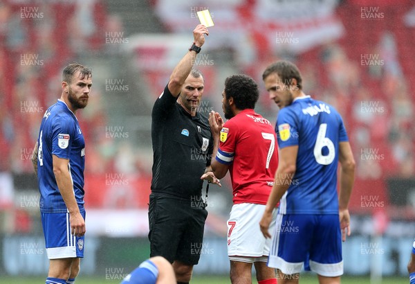 040720 - Bristol City v Cardiff City - SkyBet Championship - Korey Smith of Bristol City is given a yellow card by referee Tim Robinson