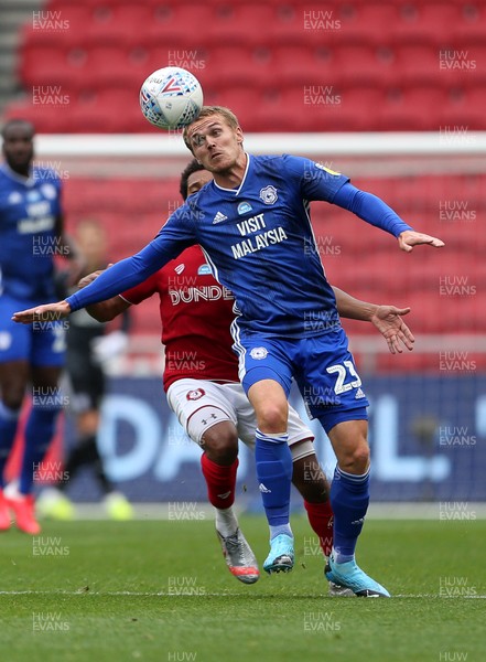 040720 - Bristol City v Cardiff City - SkyBet Championship - Goal scorer Danny Ward of Cardiff City is challenged by Korey Smith of Bristol City
