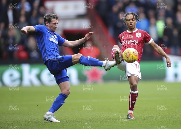 041117 - Bristol City v Cardiff City, Sky Bet Championship - Craig Bryson of Cardiff City and Bobby Reid of Bristol City compete for the ball