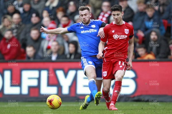 140117 - Bristol City v Cardiff City - Sky Bet Championship  Joe Ralls of Cardiff City tackles Callum O'Dowda of Bristol City by Huw Evans Agency