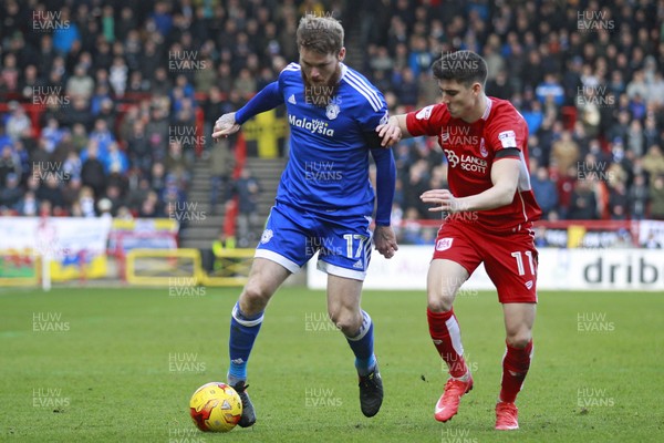 140117 - Bristol City v Cardiff City - Sky Bet Championship  Aron Gunnarsson of Cardiff City fends off Callum O'Dowda of Bristol City by Huw Evans Agency