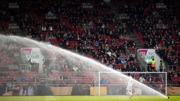 100324 - Bristol City v Swansea City - Sky Bet Championship - A sprinkler delays the start of the second half 