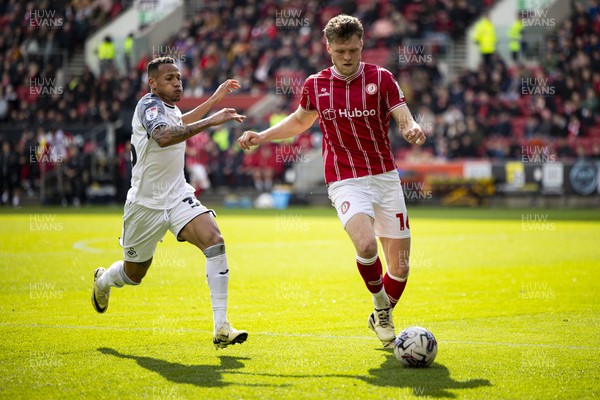 100324 - Bristol City v Swansea City - Sky Bet Championship - Rob Dickie of Bristol City in action against Ronald of Swansea City