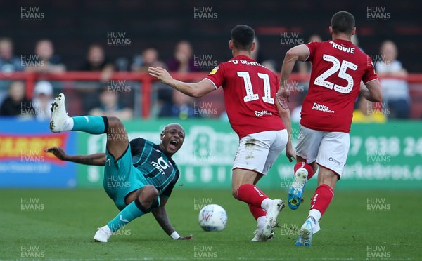 210919 - Bristol City v Swansea City - SkyBet Championship - Andre Ayew of Swansea City is taken down by Callum O'Dowda of Bristol City