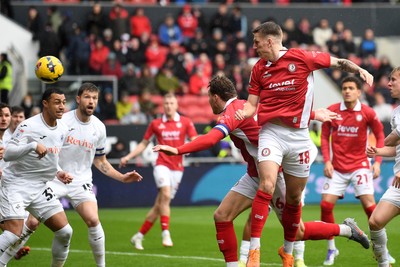 221125 - Bristol City v Swansea City - Sky Bet Championship - Emil Riis Jakobsen of Bristol City heads the ball for Rob Dickie of Bristol City to score the first goal of the game