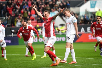221125 - Bristol City v Swansea City - Sky Bet Championship - Emil Riis Jakobsen of Bristol City heads the ball for Rob Dickie of Bristol City to score the first goal of the game