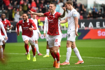 221125 - Bristol City v Swansea City - Sky Bet Championship - Emil Riis Jakobsen of Bristol City heads the ball for Rob Dickie of Bristol City to score the first goal of the game