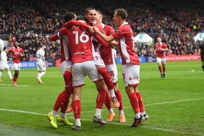 221125 - Bristol City v Swansea City - Sky Bet Championship - Rob Dickie of Bristol City celebrates scoring a goal with team mates