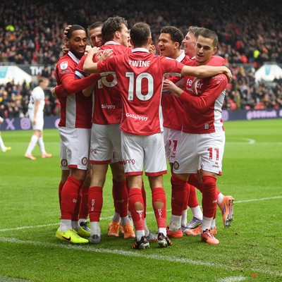 221125 - Bristol City v Swansea City - Sky Bet Championship - Rob Dickie of Bristol City celebrates scoring a goal with team mates