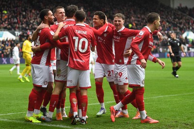 221125 - Bristol City v Swansea City - Sky Bet Championship - Rob Dickie of Bristol City celebrates scoring a goal with team mates
