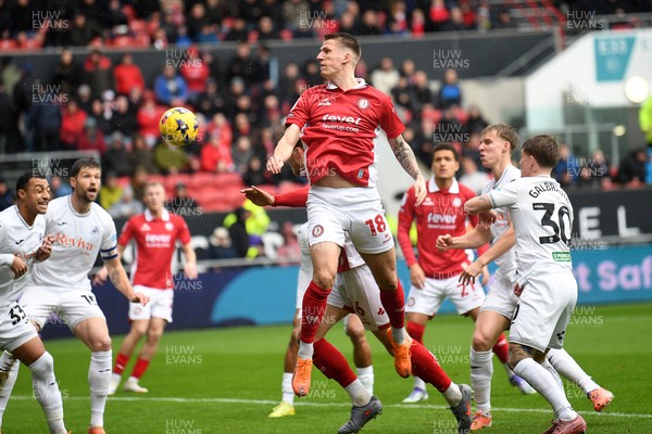 221125 - Bristol City v Swansea City - Sky Bet Championship - Emil Riis Jakobsen of Bristol City heads the ball for Rob Dickie of Bristol City to score the first goal of the game