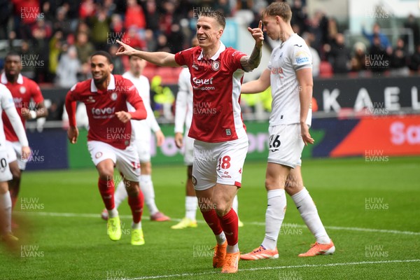 221125 - Bristol City v Swansea City - Sky Bet Championship - Emil Riis Jakobsen of Bristol City heads the ball for Rob Dickie of Bristol City to score the first goal of the game