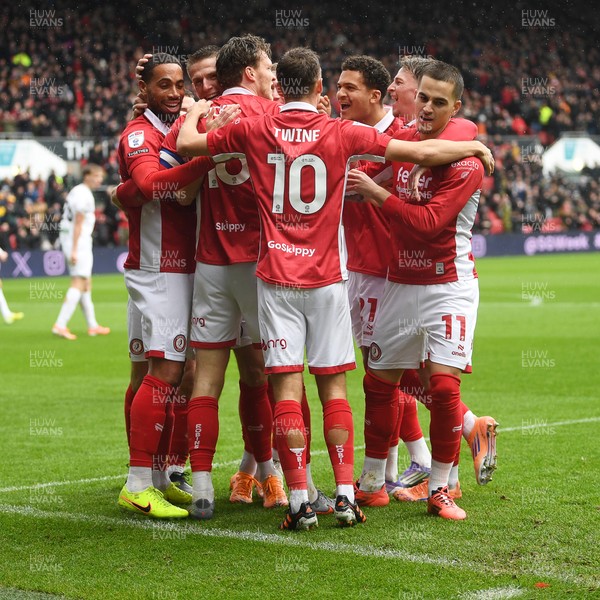 221125 - Bristol City v Swansea City - Sky Bet Championship - Rob Dickie of Bristol City celebrates scoring a goal with team mates