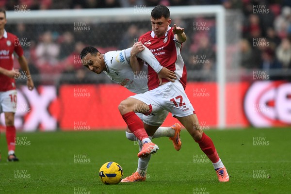221125 - Bristol City v Swansea City - Sky Bet Championship - Jason Knight of Bristol City is challenged by Adam Idah of Swansea City
