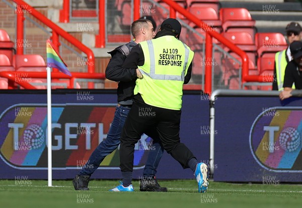 291022 - Bristol City v Swansea City - SkyBet Championship - A steward grapples with a pitch invader