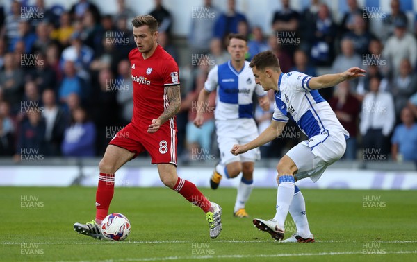 110816 - Bristol Rovers v Cardiff City - EFL Cup - Joe Ralls of Cardiff City is challenged by Tom Lockyer of Bristol Rovers