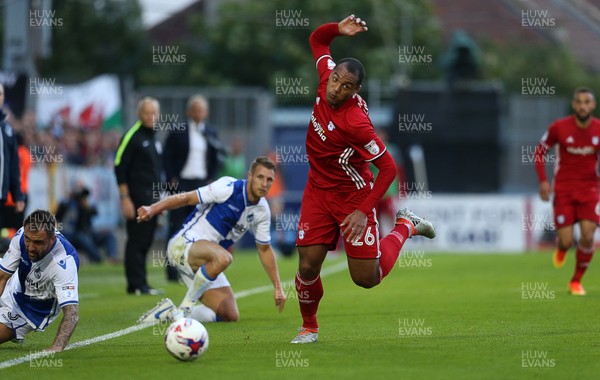 110816 - Bristol Rovers v Cardiff City - EFL Cup - Kenneth Zohore of Cardiff City is challenged by Peter Hartley of Bristol Rovers