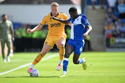 220826 - Bristol Rovers v Newport County - Sky Bet League 2 - Cameron Norman of Newport County is challenged by Clinton Mola of Bristol Rovers