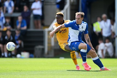 220826 - Bristol Rovers v Newport County - Sky Bet League 2 - Shaquille Gwengwe of Newport County is challenged by Kofi Balmer of Bristol Rovers