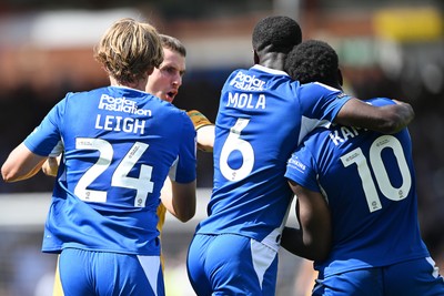 220826 - Bristol Rovers v Newport County - Sky Bet League 2 - Things heat up after Bobby Kamwa of Bristol Rovers scores a goal and runs towards the Newport supporters
