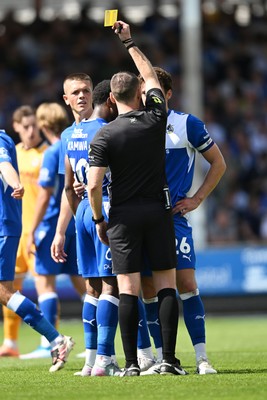 220826 - Bristol Rovers v Newport County - Sky Bet League 2 - Bobby Kamwa of Bristol Rovers is shown a yellow card