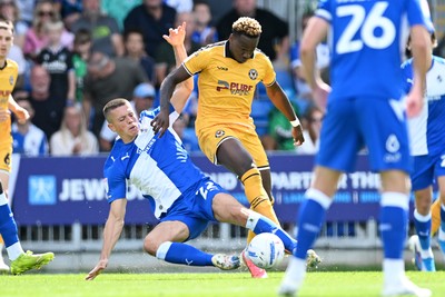 220826 - Bristol Rovers v Newport County - Sky Bet League 2 - Shaquille Gwengwe of Newport County is challenged by Keenan Gough of Bristol Rovers