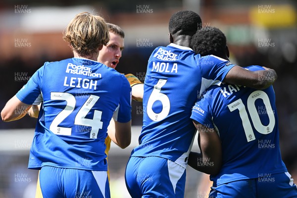 220826 - Bristol Rovers v Newport County - Sky Bet League 2 - Things heat up after Bobby Kamwa of Bristol Rovers scores a goal and runs towards the Newport supporters